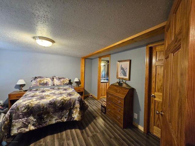 4732 San Juan Dr, Fargo, ND 58103 - bedroom with dark wood-type flooring, baseboards, and a textured ceiling