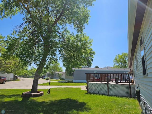 4732 San Juan Dr, Fargo, ND 58103 - view of grassy yard with a deck