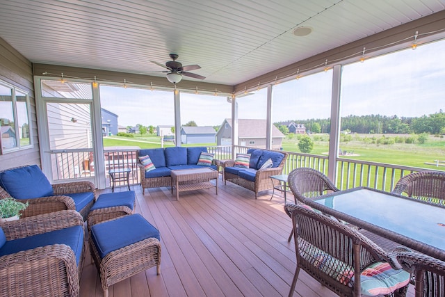 2142 Monarch Ct, Sartell, MN 56377 - sunroom with an outdoor living space and a ceiling fan