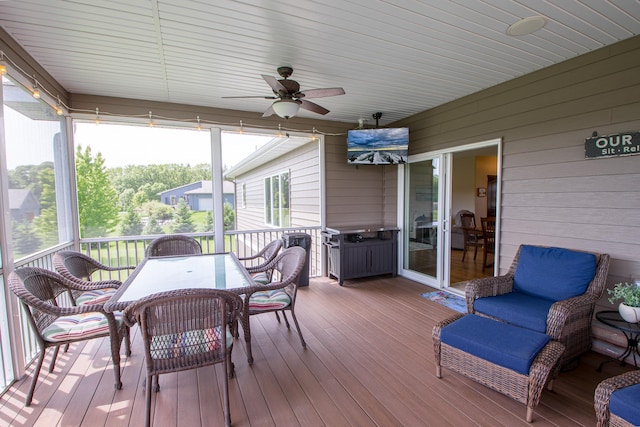 2142 Monarch Ct, Sartell, MN 56377 - sunroom / solarium with ceiling fan and outdoor dining area
