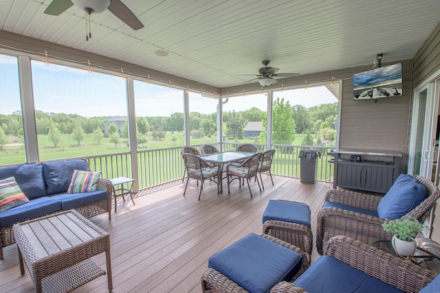 2142 Monarch Ct, Sartell, MN 56377 - sunroom / solarium with a ceiling fan and outdoor dining area