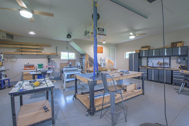 2142 Monarch Ct, Sartell, MN 56377 - dining space with ceiling fan and a workshop area