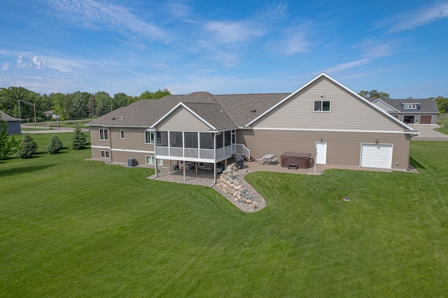 2142 Monarch Ct, Sartell, MN 56377 - rear view of house with a hot tub, a sunroom, a yard, roof with shingles, and a patio