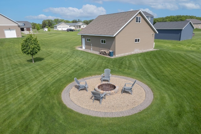 2142 Monarch Ct, Sartell, MN 56377 - view of green lawn featuring a fire pit