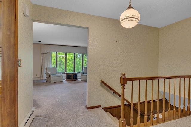 2916 Golf View Ct, Saint Cloud, MN 56301 - hall featuring baseboard heating, carpet flooring, an upstairs landing, wallpapered walls, and a textured ceiling