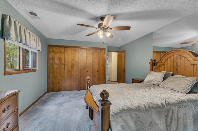 2916 Golf View Ct, Saint Cloud, MN 56301 - bedroom with carpet, a closet, baseboards, a textured ceiling, and ceiling fan