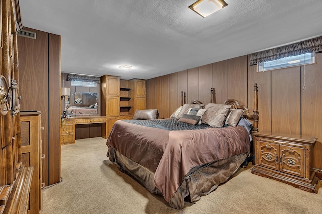 2916 Golf View Ct, Saint Cloud, MN 56301 - bedroom featuring light colored carpet, a textured ceiling, and wood walls