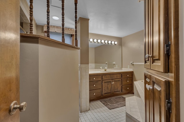 2916 Golf View Ct, Saint Cloud, MN 56301 - bathroom featuring a bath, vanity, and tile patterned floors