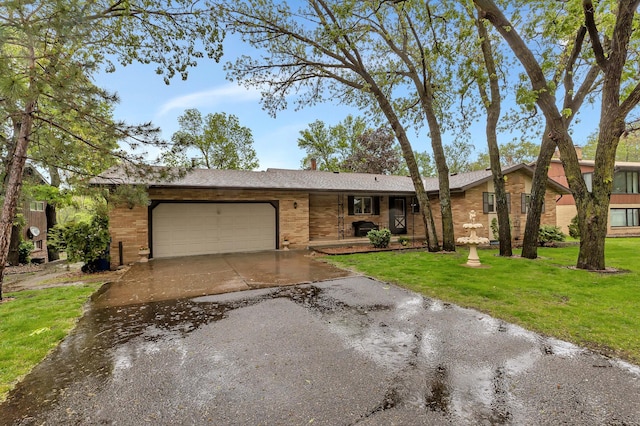 2916 Golf View Ct, Saint Cloud, MN 56301 - ranch-style home featuring asphalt driveway, a front yard, an attached garage, and a chimney