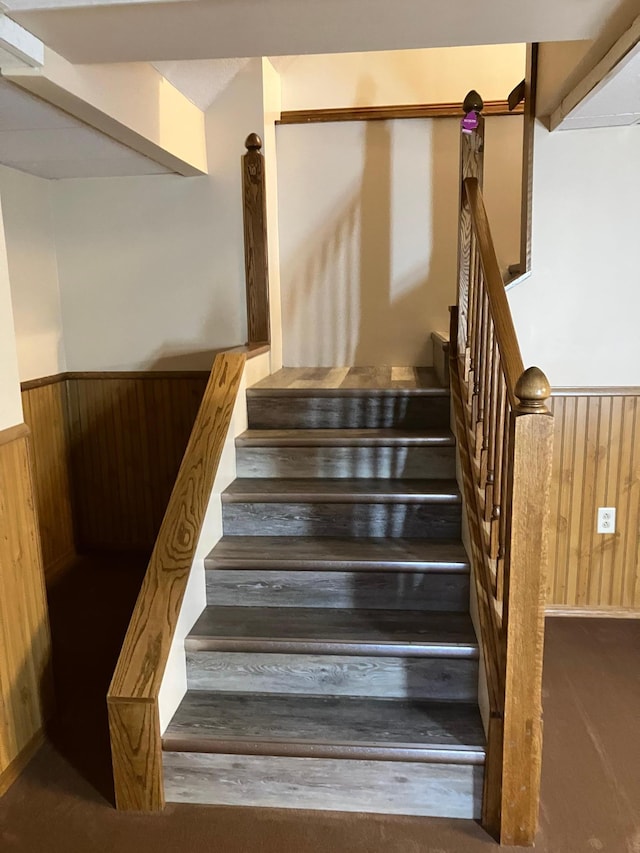 903 2nd St, Princeton, MN 55371 - stairway with wainscoting and wooden walls