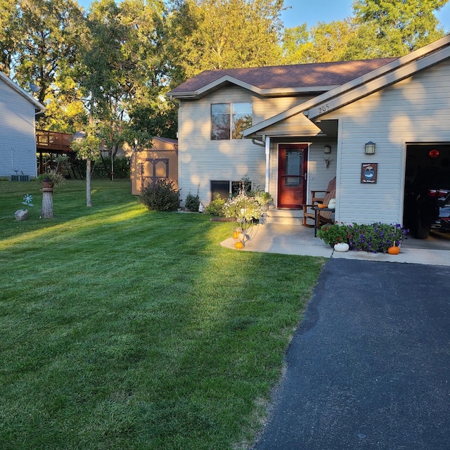 205 Darling Pl, Alexandria, MN 56308 - view of front of home featuring a front lawn and a garage