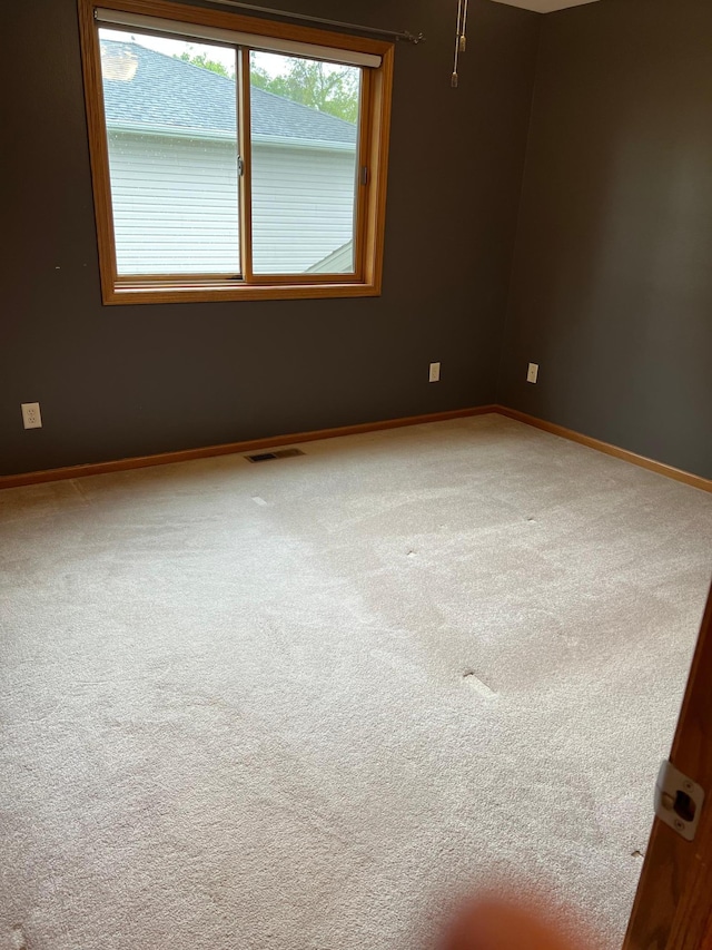 205 Darling Pl, Alexandria, MN 56308 - carpeted empty room featuring baseboards
