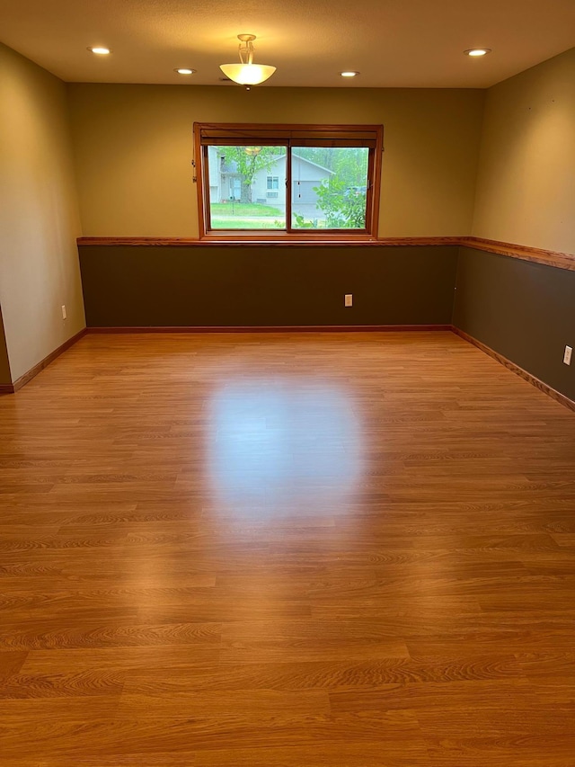 205 Darling Pl, Alexandria, MN 56308 - spare room with light wood finished floors, recessed lighting, and baseboards