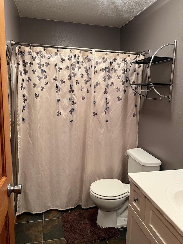 205 Darling Pl, Alexandria, MN 56308 - bathroom with toilet, vanity, tile patterned floors, a shower with shower curtain, and a textured ceiling
