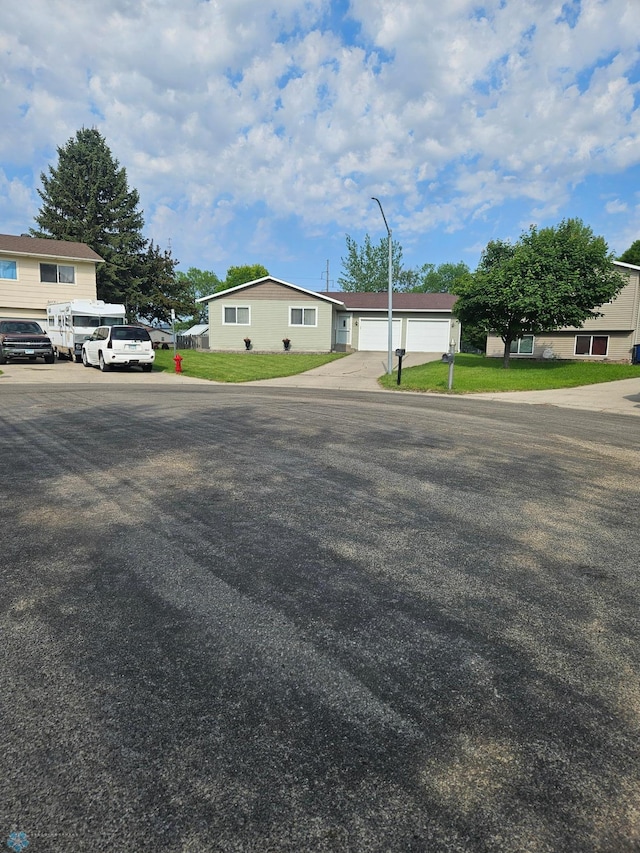 2904 17th Ave S, Moorhead, MN 56560 - view of front facade featuring concrete driveway and a garage