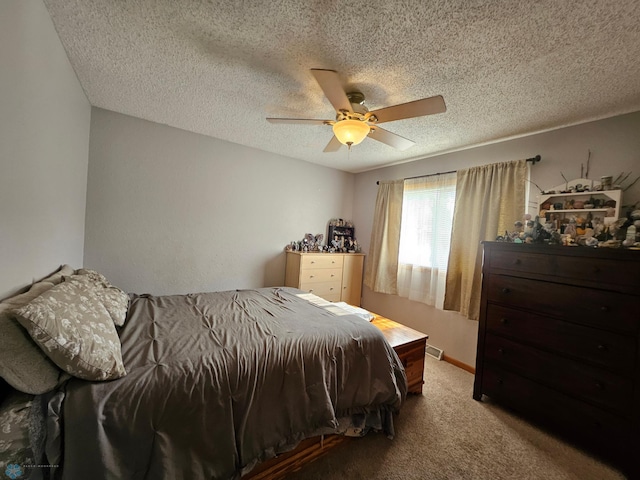 2904 17th Ave S, Moorhead, MN 56560 - carpeted bedroom featuring a textured ceiling and ceiling fan