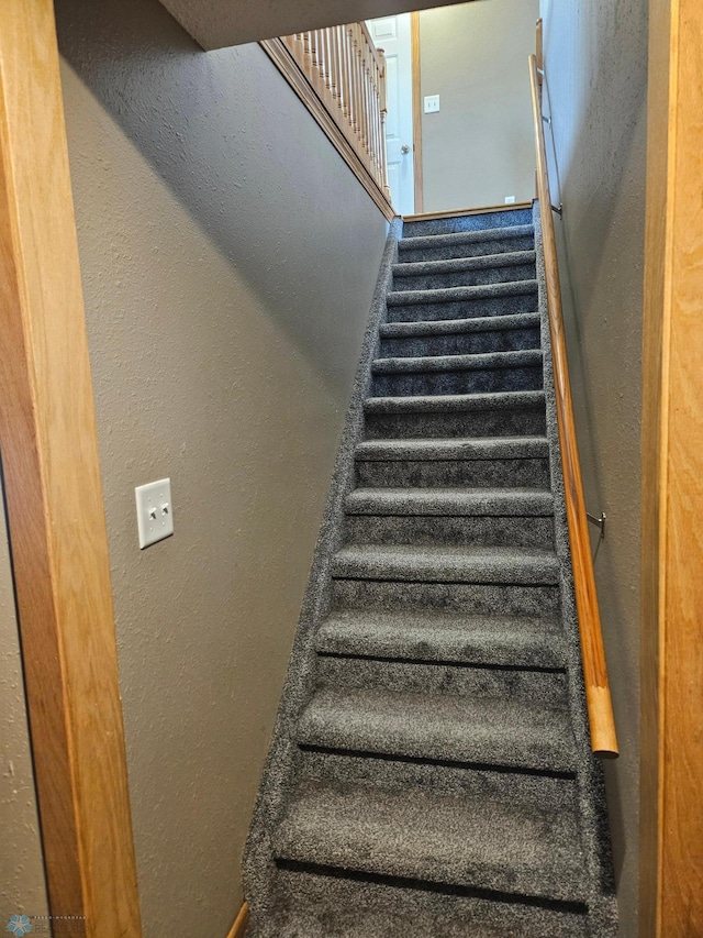 2904 17th Ave S, Moorhead, MN 56560 - staircase with a textured wall