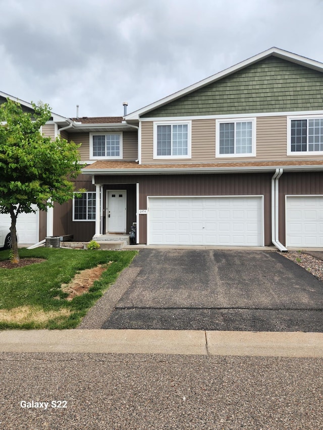 6454 Appaloosa Ave S, Forest Lake, MN 55025 - view of front of house with driveway and an attached garage