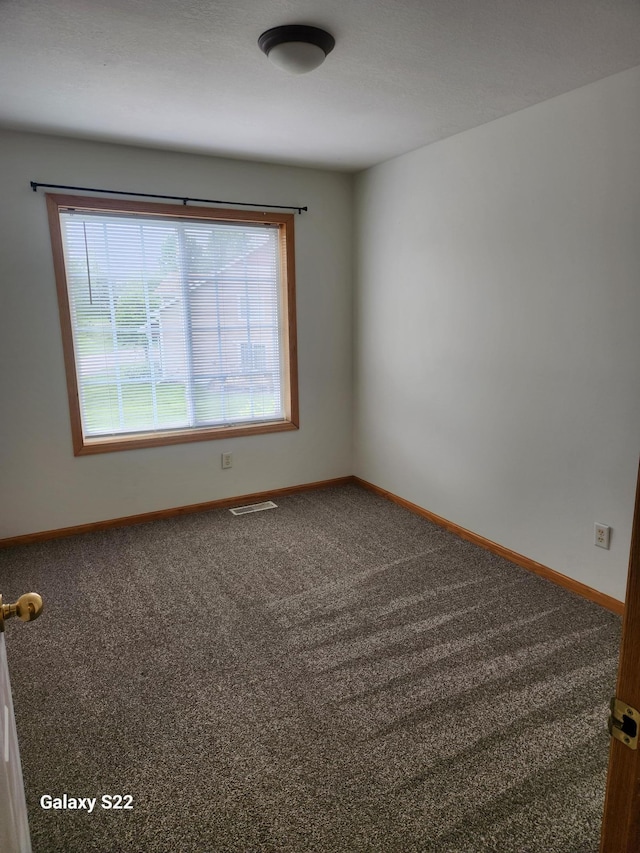 6454 Appaloosa Ave S, Forest Lake, MN 55025 - carpeted spare room with baseboards