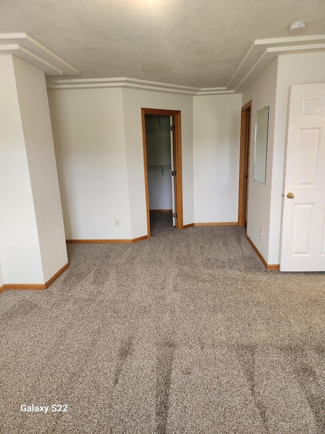 6454 Appaloosa Ave S, Forest Lake, MN 55025 - carpeted empty room featuring baseboards, a smoke detector, and a textured ceiling