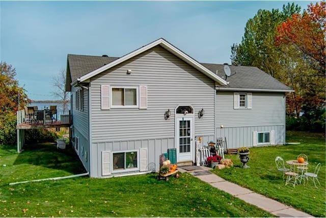 28320 State Highway 65, Pengilly, MN 55775 - back of house featuring a lawn, a deck, and board and batten siding