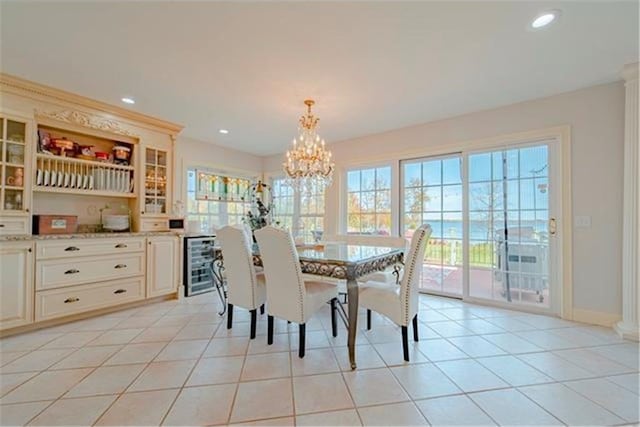 28320 State Highway 65, Pengilly, MN 55775 - dining area with beverage cooler, a chandelier, healthy amount of natural light, recessed lighting, and light tile patterned floors