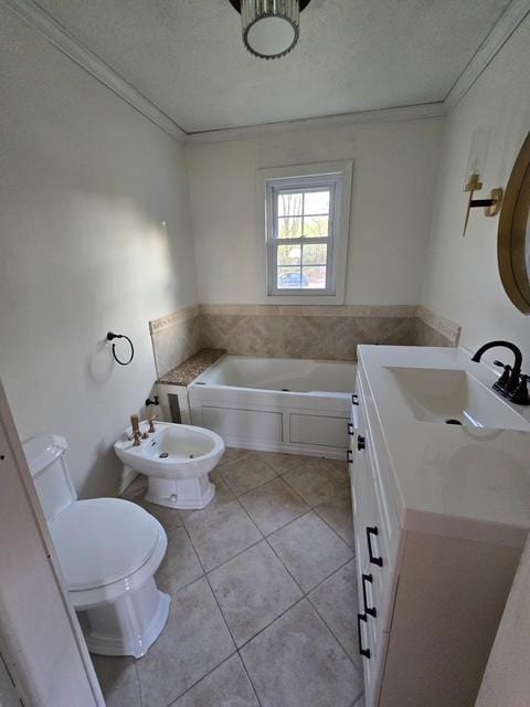 28320 State Highway 65, Pengilly, MN 55775 - bathroom featuring toilet, a textured ceiling, tile patterned flooring, a bath, and vanity