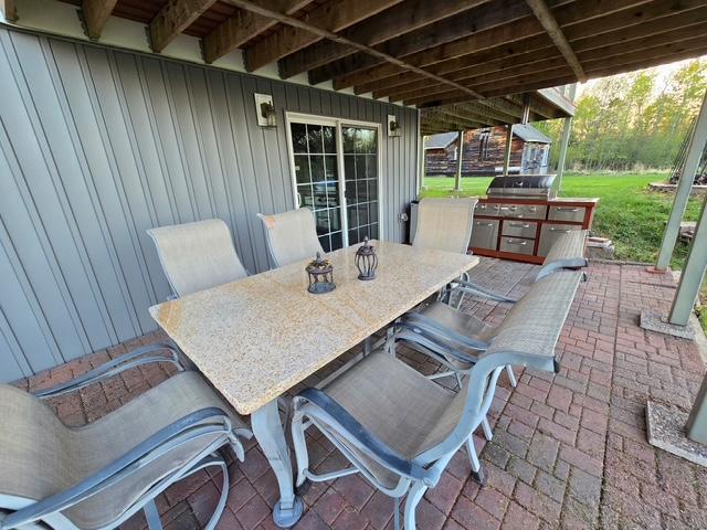 28320 State Highway 65, Pengilly, MN 55775 - view of patio / terrace featuring outdoor dining area and area for grilling