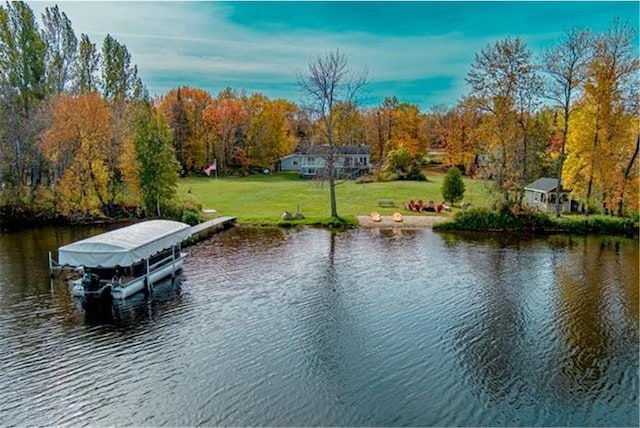 28320 State Highway 65, Pengilly, MN 55775 - dock area featuring a water view, a lawn, and view of scattered trees