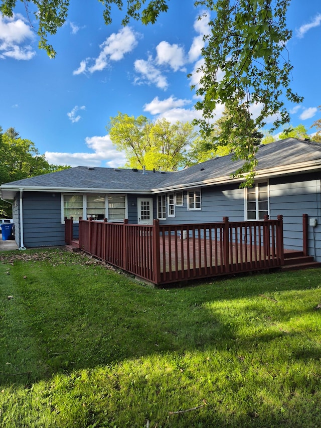 227 Summit Ave, Grantsburg, WI 54840 - back of property with a deck and a yard
