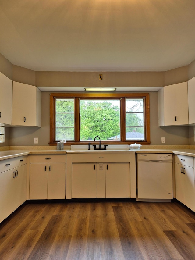 227 Summit Ave, Grantsburg, WI 54840 - kitchen with white dishwasher, healthy amount of natural light, and light countertops