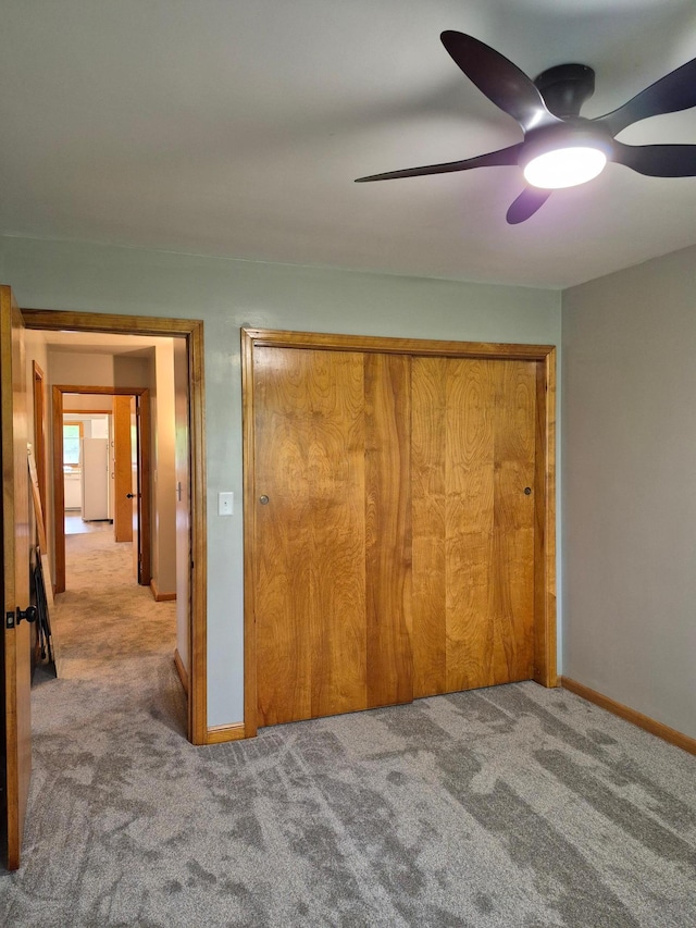 227 Summit Ave, Grantsburg, WI 54840 - unfurnished bedroom with carpet floors, a closet, and baseboards