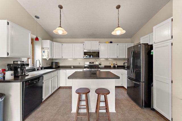 7150 Upper 157th St W, Apple Valley, MN 55124 - kitchen with appliances with stainless steel finishes, a sink, vaulted ceiling, dark countertops, and a kitchen island