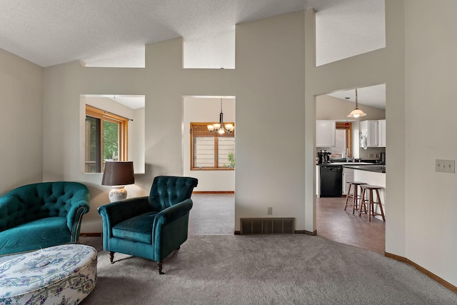 7150 Upper 157th St W, Apple Valley, MN 55124 - living room featuring a chandelier, carpet, baseboards, and vaulted ceiling