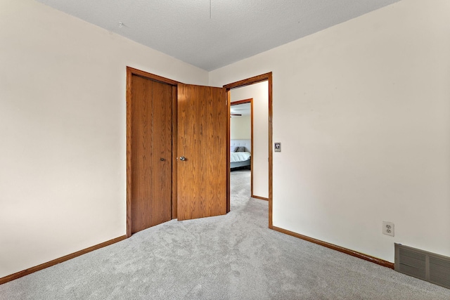 7150 Upper 157th St W, Apple Valley, MN 55124 - unfurnished bedroom featuring carpet floors, a closet, and baseboards