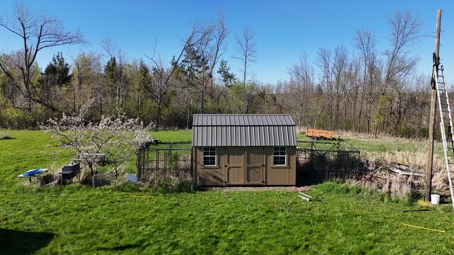 398 11 1/2 Ave, Turtle Lake, WI 54889 - view of shed featuring a view of trees