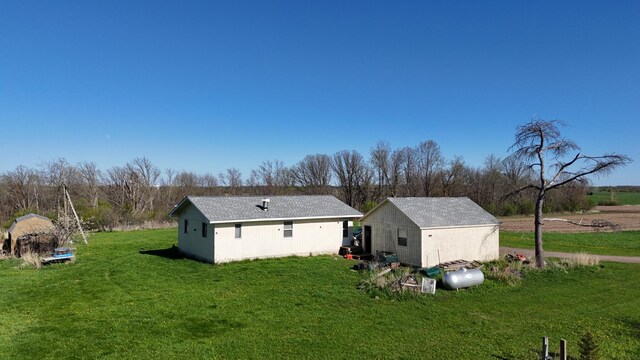 398 11 1/2 Ave, Turtle Lake, WI 54889 - rear view of property with a yard and an outbuilding