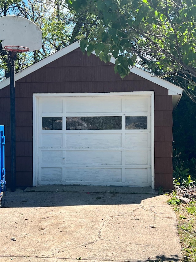 623 4th St, Madison, MN 56256 - detached garage featuring concrete driveway