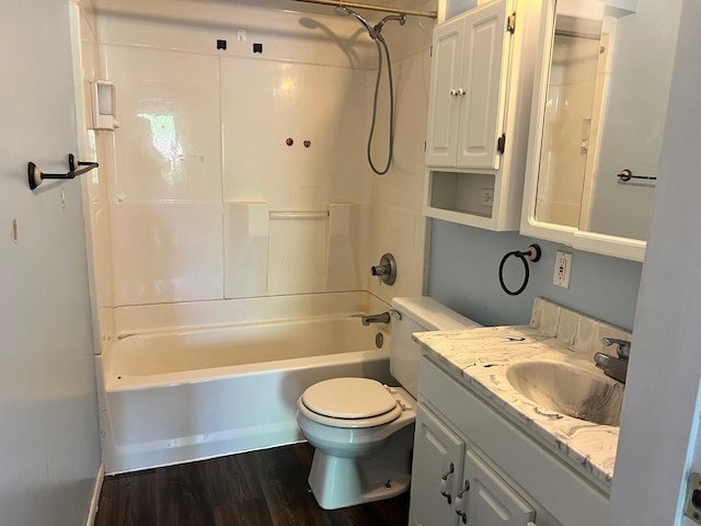 623 4th St, Madison, MN 56256 - bathroom featuring toilet, vanity, bathing tub / shower combination, and wood finished floors