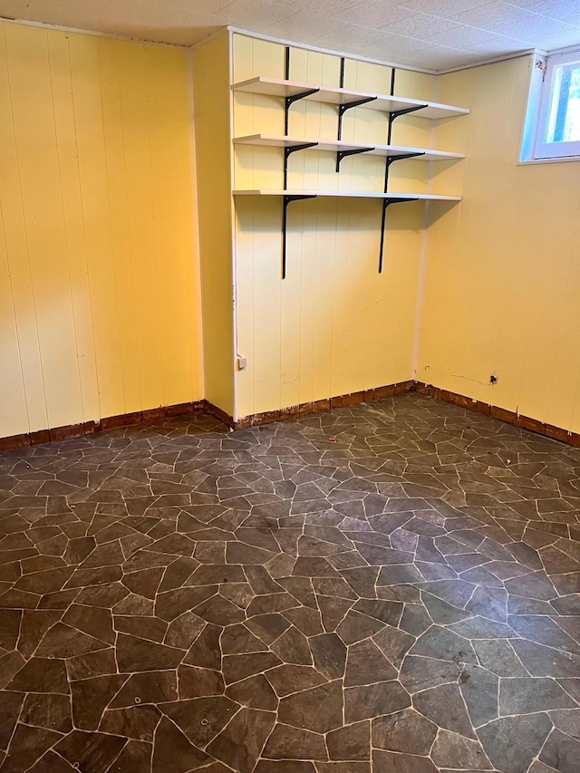 623 4th St, Madison, MN 56256 - empty room featuring baseboards and stone flooring