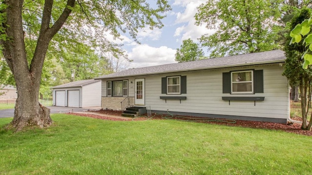 109 Lilac St, Eau Claire, WI 54703 - ranch-style home with a front yard, entry steps, a garage, and driveway