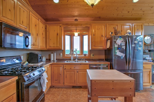 2200 405th Ave NW, Braham, MN 55006 - kitchen with stainless steel appliances, wood ceiling, light tile patterned flooring, wooden counters, and recessed lighting