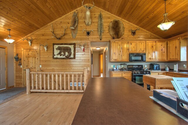 2200 405th Ave NW, Braham, MN 55006 - kitchen featuring black appliances, wooden walls, light wood finished floors, high vaulted ceiling, and wooden ceiling