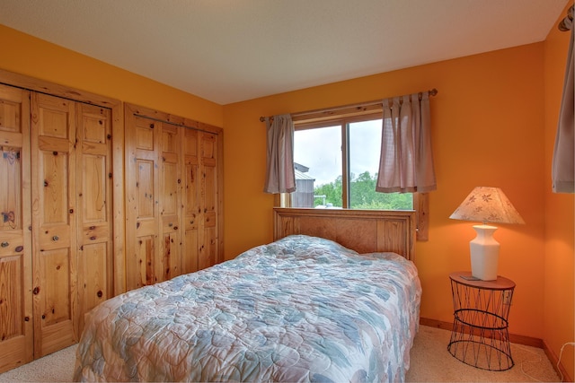 2200 405th Ave NW, Braham, MN 55006 - carpeted bedroom featuring baseboards