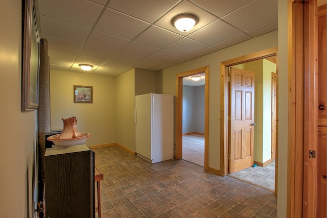 2200 405th Ave NW, Braham, MN 55006 - hallway with a paneled ceiling and brick patterned flooring