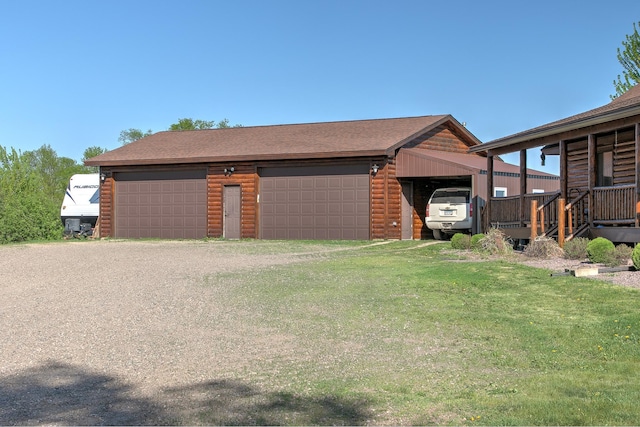 2200 405th Ave NW, Braham, MN 55006 - view of front of home featuring a detached garage, an outdoor structure, a front lawn, and roof with shingles
