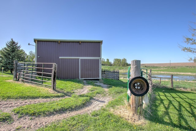 2200 405th Ave NW, Braham, MN 55006 - view of yard featuring an outbuilding and a water view