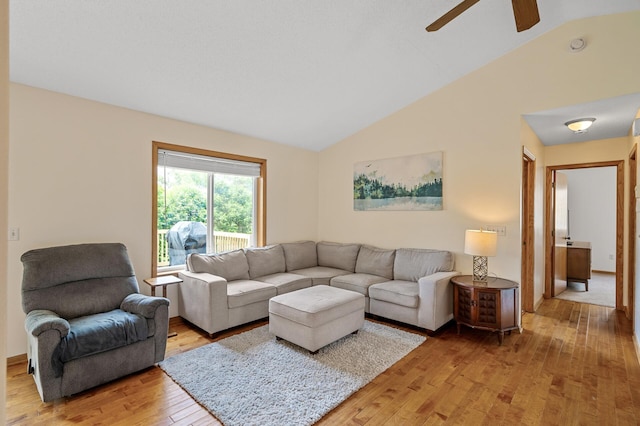 2572 91st Ln NE, Blaine, MN 55449 - living area with vaulted ceiling, light wood-type flooring, and ceiling fan