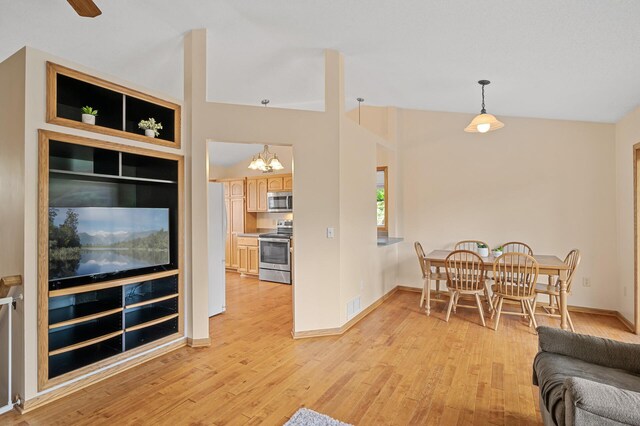 2572 91st Ln NE, Blaine, MN 55449 - living room with light wood-style flooring, a chandelier, and baseboards
