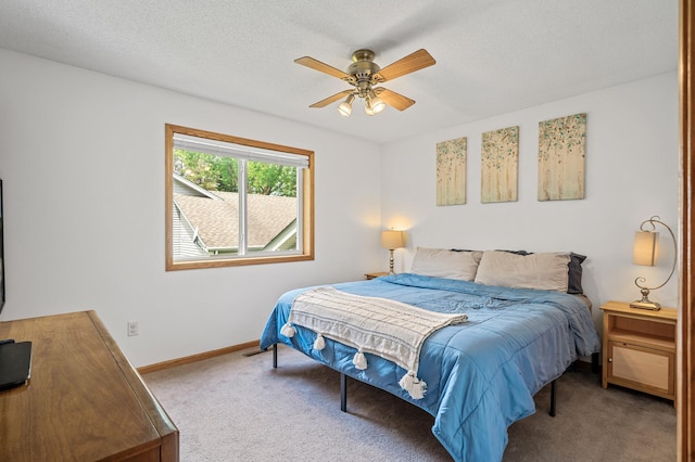 2572 91st Ln NE, Blaine, MN 55449 - carpeted bedroom with baseboards and ceiling fan